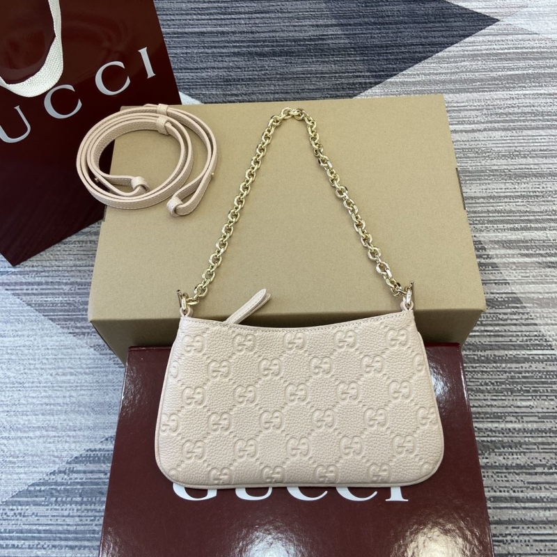 G*u*i top handle bags